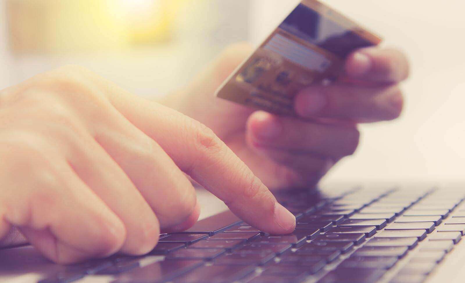 consumer enters debit card zip code on a laptop