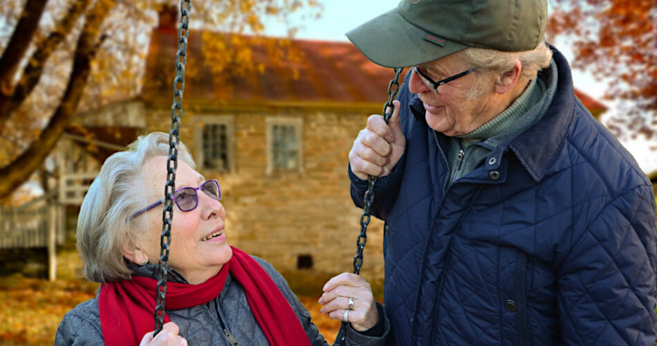 retired couple at swing, finances secure thanks to the right reverse mortgage