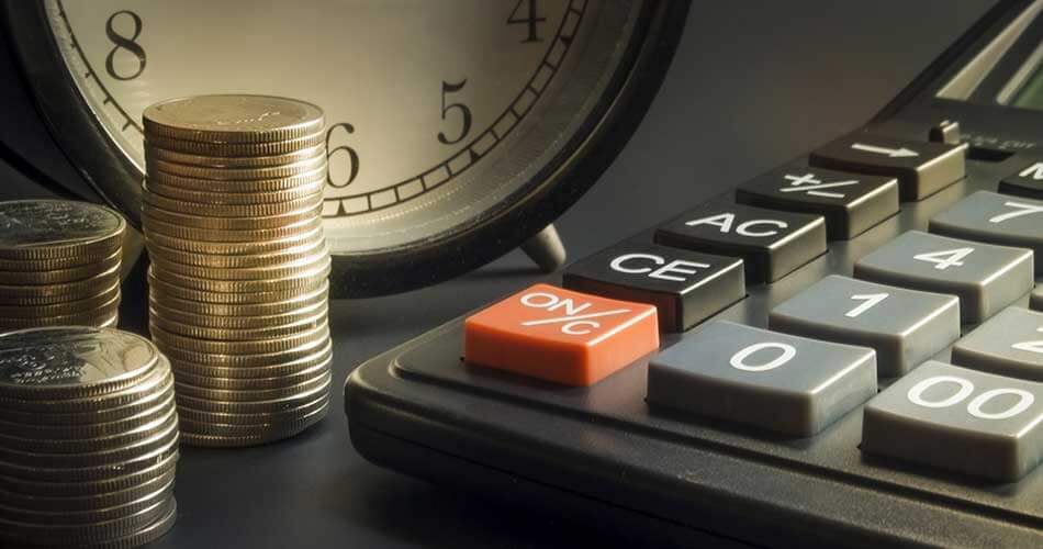 image of money a clock and a calculator to symbolize tax-deferred accounts