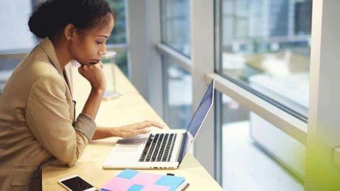 Woman considering whether to waive the mortgage contingency clause when bidding for a home