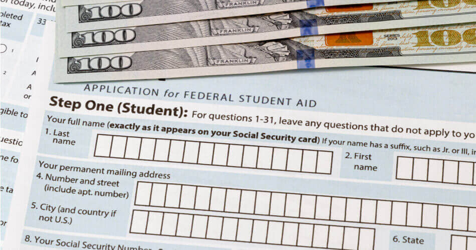 Federal student aid application under $100 bills