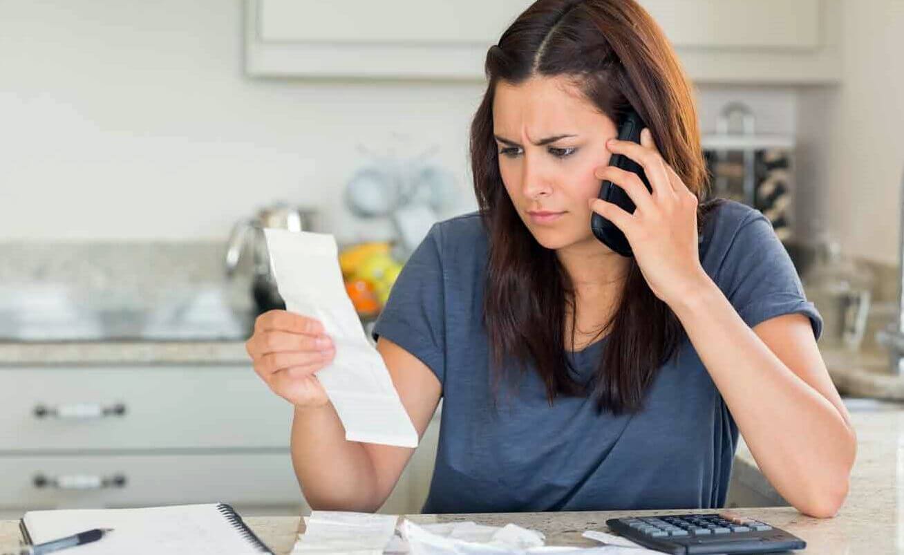 lady concerned because she is being called by debt collectors