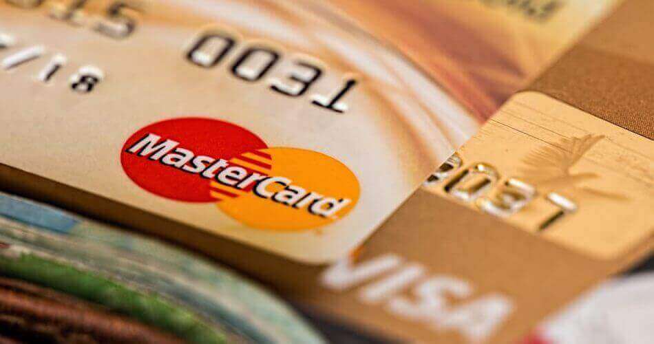 Close-up of a Mastercard on top of a Visa credit card