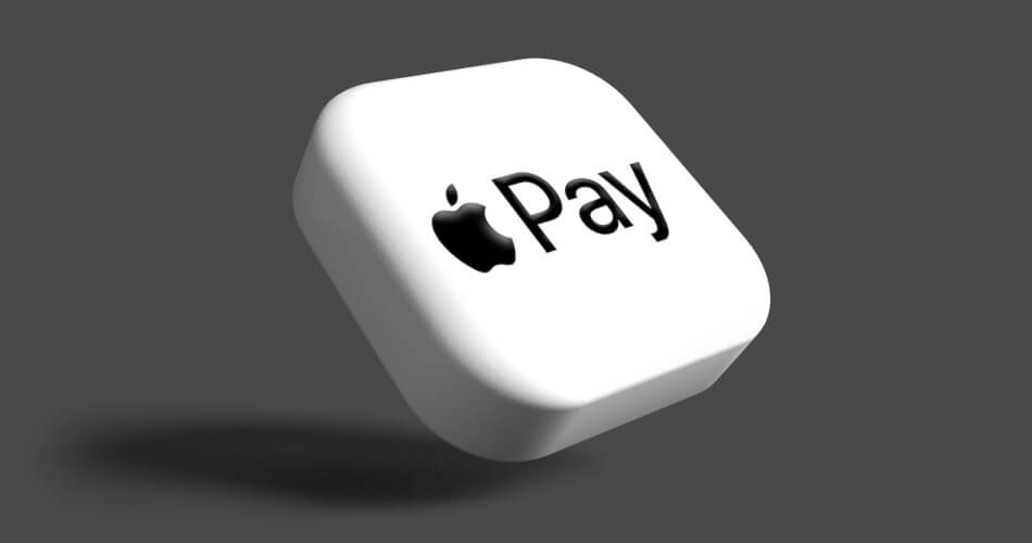 Block-on-white Apple Pay symbol on floating button casting shadow on dark grey background