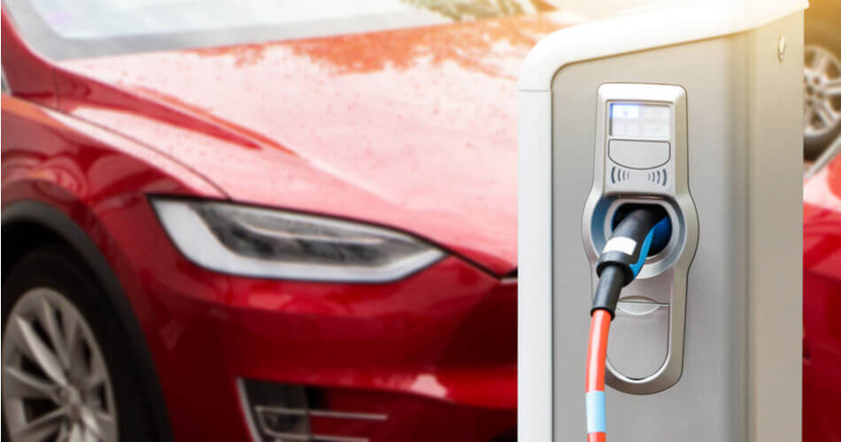 Tesla charging at a charging port, and the the cost to charge this Tesla is minor