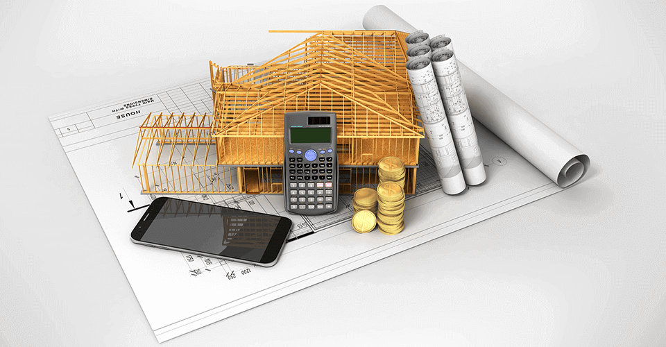 Image of house plans, a calculator, and money to symbolize the idea of financing a new construction home