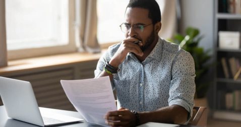 Man reviewing current savings account rates