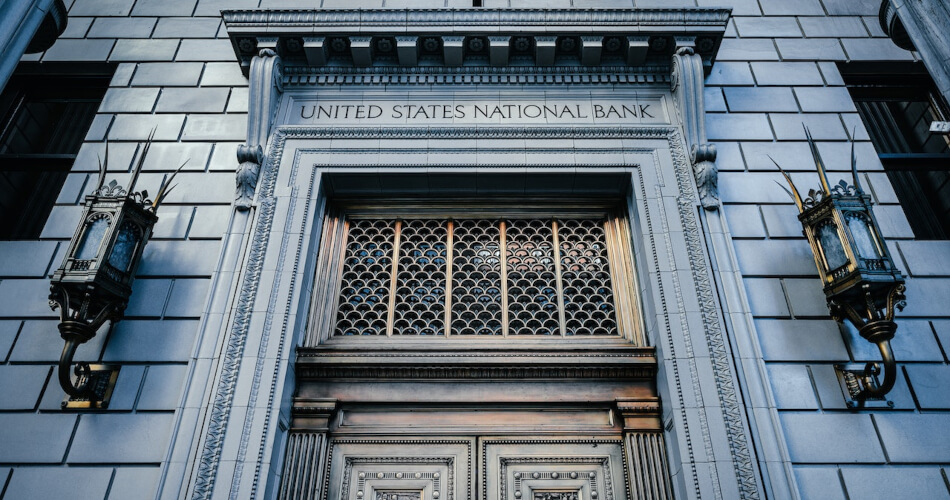 Stone facade of United States National Bank, used to symbolize banking in general.
